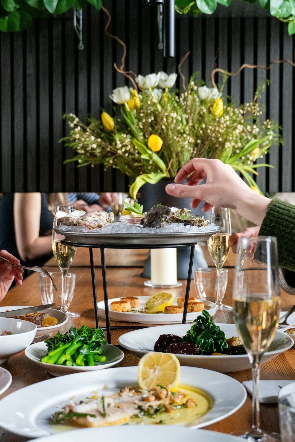 Crabshakk – seafood tower and flowers on the table